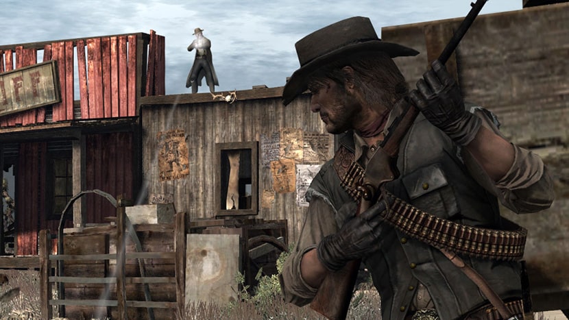 John se cubre de los disparos de un enemigo en Red Dead Redemption.