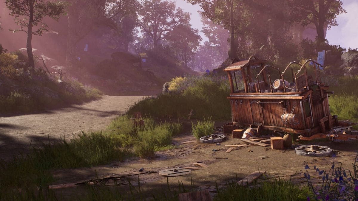 Muestra de los gráficos de Ashes of Creation en una escena que muestra un carro destruido junto a un camino