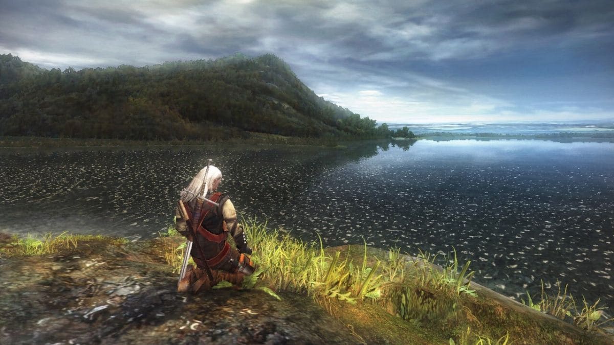 Geralt de Rivia meditando en el primer juego de The Witcher