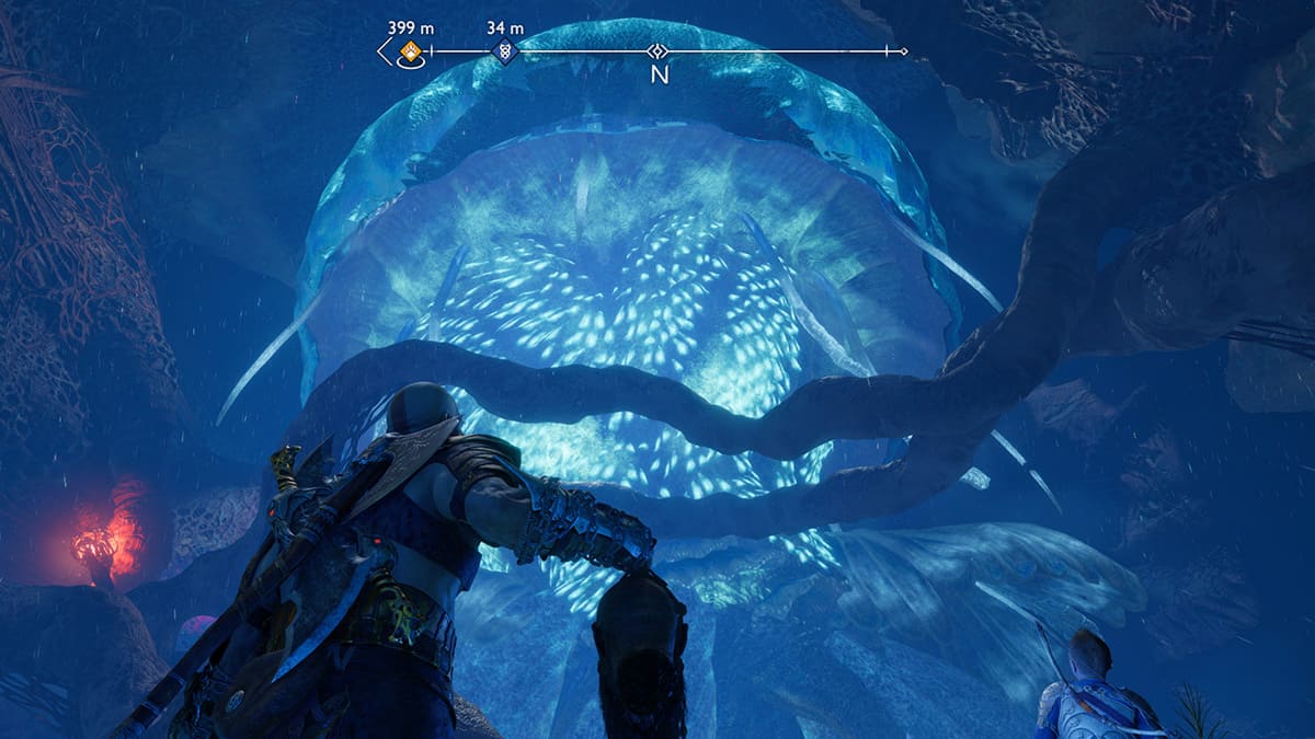 Kratos y sus aliados contemplan una medusa voladora gigante.